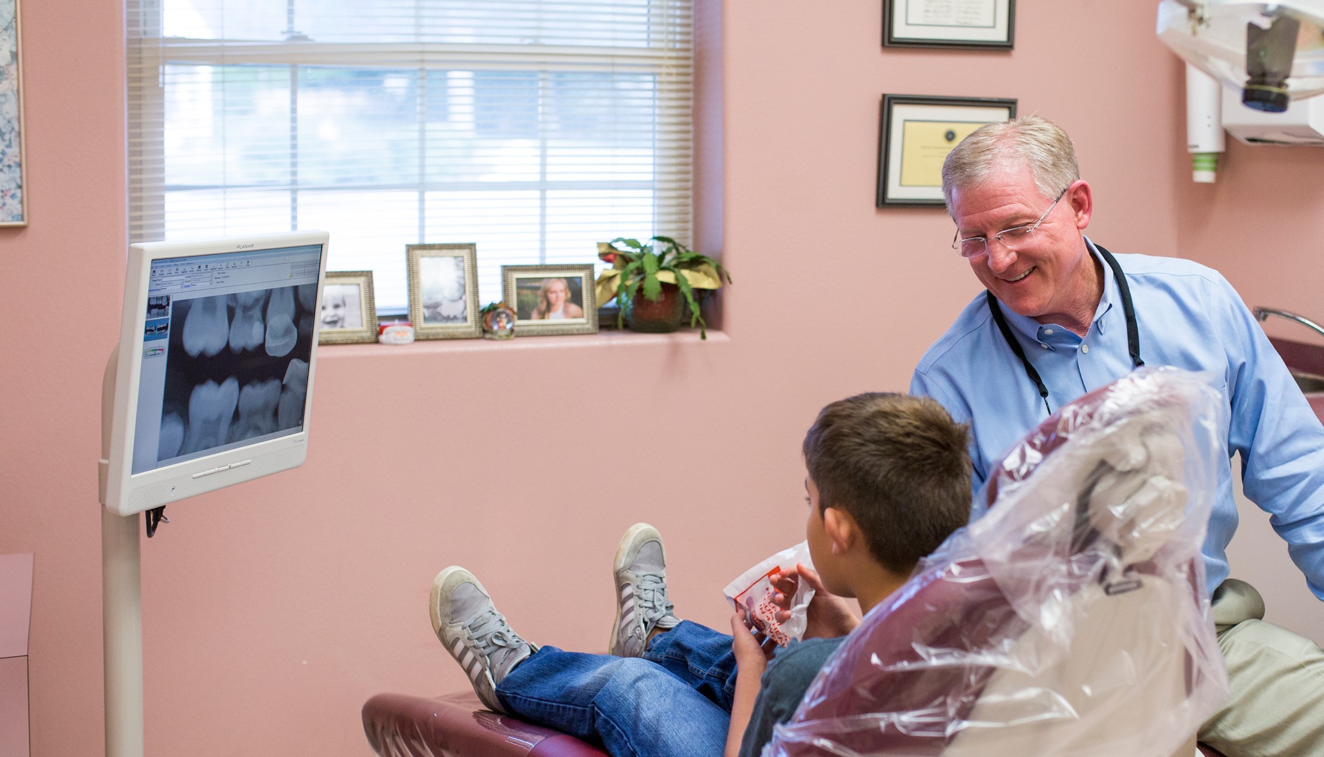 Doctor Braden examining young patient